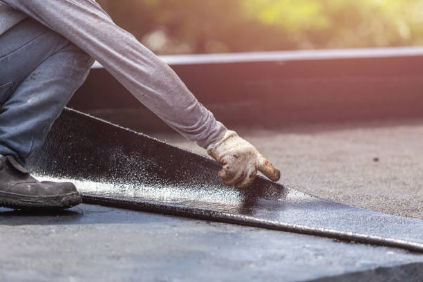 Professional Exterior Waterproofing technician working in Alto, MI